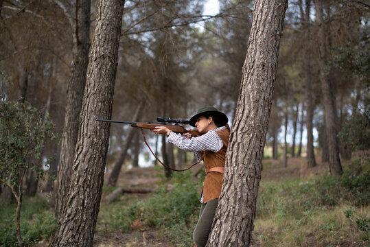 Photographs of a Spanish female hunter in her traditional uniform: Images should NOT be used for anti-hunting campaigns.