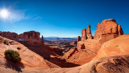 Fototapeta premium Sunlit Wonders: Panoramic Views of Arches National Park