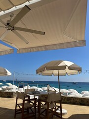 Seaside Dining in Cabo: Coastal Views and Comfort under White Umbrellas