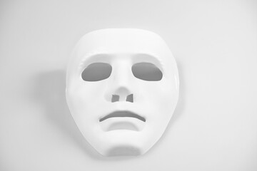 white mask on black background
