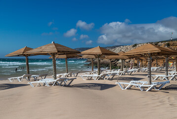 Sun loungers and umbrellas on the beach