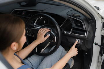 Woman Starting Car Engine 