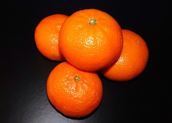 Tasty summer fruits on a wooden table. Fruits. Orange