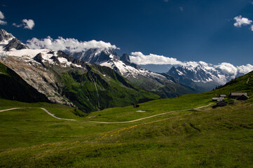 Alpine landscape in Switzerland, Alps mountains, green meadows