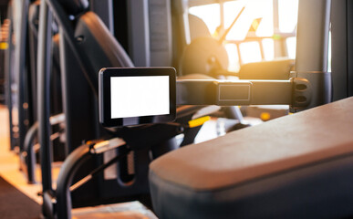 Closeup image of simulator with screen at gym. exercise machine with screen