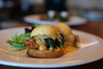 BENEDICTS AVOCAD0 asparagus lime hollandaise restaurant chic serving eggs benedict