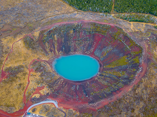 Aerial view of the most colorful volcano crater in Iceland - Kerid Crater, filled with turquoise water © Siyue