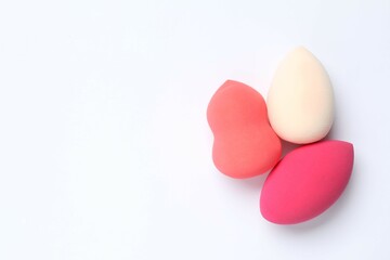 Beauty blender on a white background. Bright sponges for make-up cosmetics. Make-up products. Beauty concept