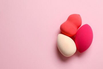 Beauty blender on a color background. Bright sponges for make-up cosmetics. Make-up products. Beauty concept