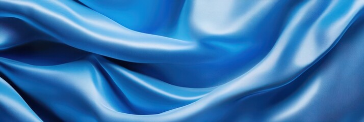Obraz premium Luxurious blue satin fabric texture for fashion and design projects. World Theatre day. Horizontal banner. Copy space. Blue fabric texture background