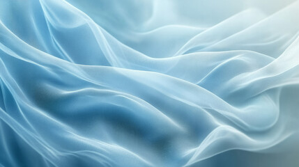 Fototapeta premium Soft blue fabric drapes gently under soft light in a serene setting