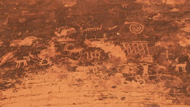 Native petroglyphs on a rock face, Valley of Fire State Park, Nevada, USA