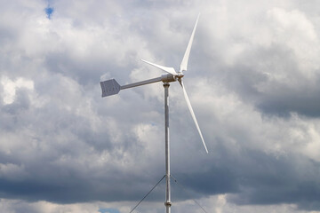 Windmill as a source of renewable energy and sustainable resource. Wind turbine.