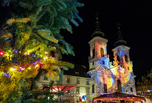 Beautiful Christmas decorations and Mariahilfer church , at night, in the city center of Graz, Styria region, Austria