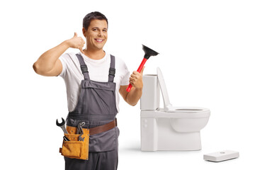 Plumber unclogging a toilet with a plunger