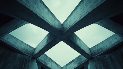 A dramatic architectural view looking up at a geometric concrete ceiling under a moody sky.