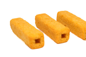 fried stick snack corn flavor isolated on white background.snack food indonesia