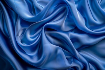 Obraz premium Photo of Blue silk fabric drapery material. Background texture for backdrops or mapping