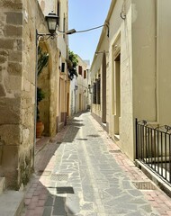 Curtains narrow street in an old mediterranean  style city