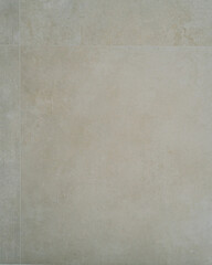 Fototapeta premium textured beige colored wall with beautiful splashes optic concrete, bathroom tiles, for floors and walls