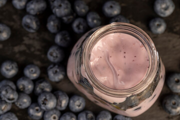 fresh cold yogurt with the taste and berries of ripe blueberries