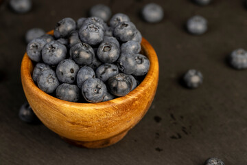 details of blueberries stacked in a bowl