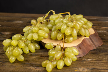 a large number of ripe green grapes are on the table