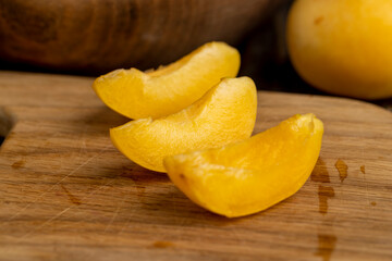 ripe soft apricot fruits on the cutting board