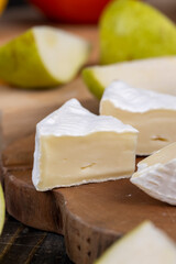 fresh cheese on a cutting board