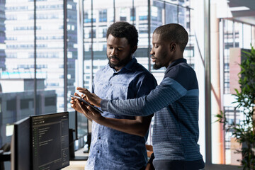 Team of technicians working with machine learning tech advancing AI innovating autonomous systems....