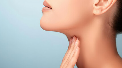 A stunning profile view of a woman exuding grace, with flawless face contours and a gentle touch on her neck.