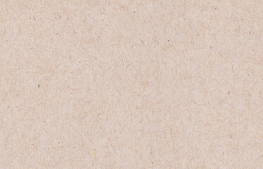 Close-up of a beige paper texture with natural fibers, perfect for backgrounds or design projects.