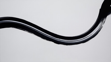 A striking abstract painting featuring sweeping black brushstrokes against a crisp white background, conveying movement and elegance.