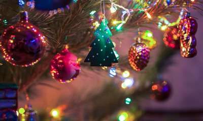 New Year. Christmas tree. A toy in the form of balloons lights. Picture taken in Ukraine. Kiev region. Horizontal frame. Color image. Soft focus.