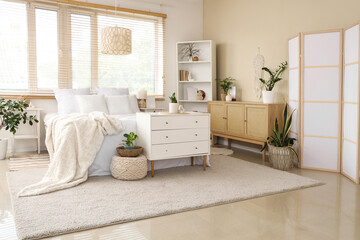 Interior of comfortable modern stylish bedroom