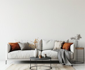 Minimalist living room interior with a beige sofa. wooden side tables. and a decorative vase with branches