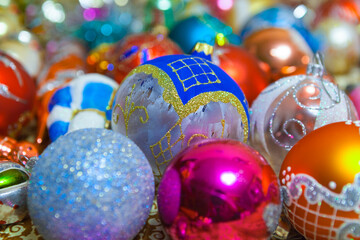 Winter day, evening, night. Christmas and New Year. In the frame there are a lot of Christmas decorations - balls. Old, retro. Horizontal frame. Soft focus.