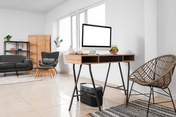 Computer on workplace in living room