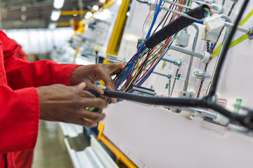 car wire harness factory, wiring cable template on a panel, for the workers