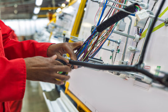 car wire harness factory, wiring cable template on a panel, for the workers