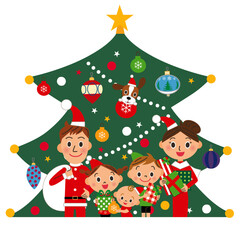 クリスマスツリーの前にサンタクロースの仮装をしている家族
