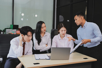 Fototapeta premium Frustrated upset multiracial business team people sad with bad work result in report disappointed in corporate bankruptcy failure crisis worried of paperwork problem sit at table at office meeting