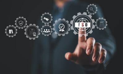 ISO Certification Concept. Businessman touch representation of ISO certification, icons symbolizing quality assurance, compliance, global standards, and International organization for standardization.