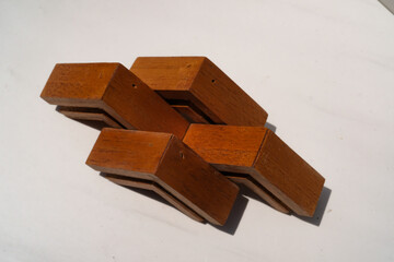 Four Pieces of Wooden Angle Arranged Standing. Piece of wood isolated on white background. Furniture Industry. Isolated objects. White Backgrounds. Graphic Resources