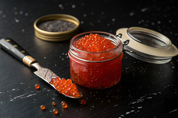 red caviar on spoon