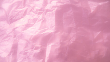 Fototapeta premium Crumpled pink paper texture. Abstract background and texture for design.