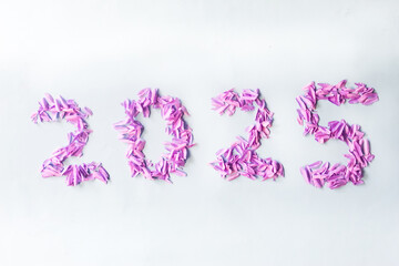 new year 2025 made of purple flowers