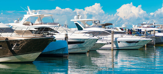 Luxury yacht boat moored at harbor pier in Miami beach summer marina, Florida
