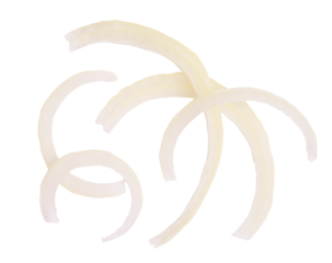 Top view large onion slice into strips on white background