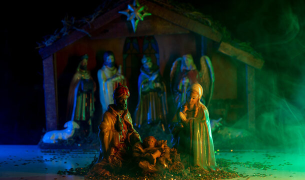 Bethlehem. Traditional Christmas scene birth of Jesus. Christmas creche with Joseph Mary and Jesus. Christmas Manger scene with figurines including Jesus, Mary, Joseph, sheep and magi.